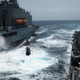 Image for article titled You Think Your Commute Sucks? Try A Highline Transfer Between Two Ships!
